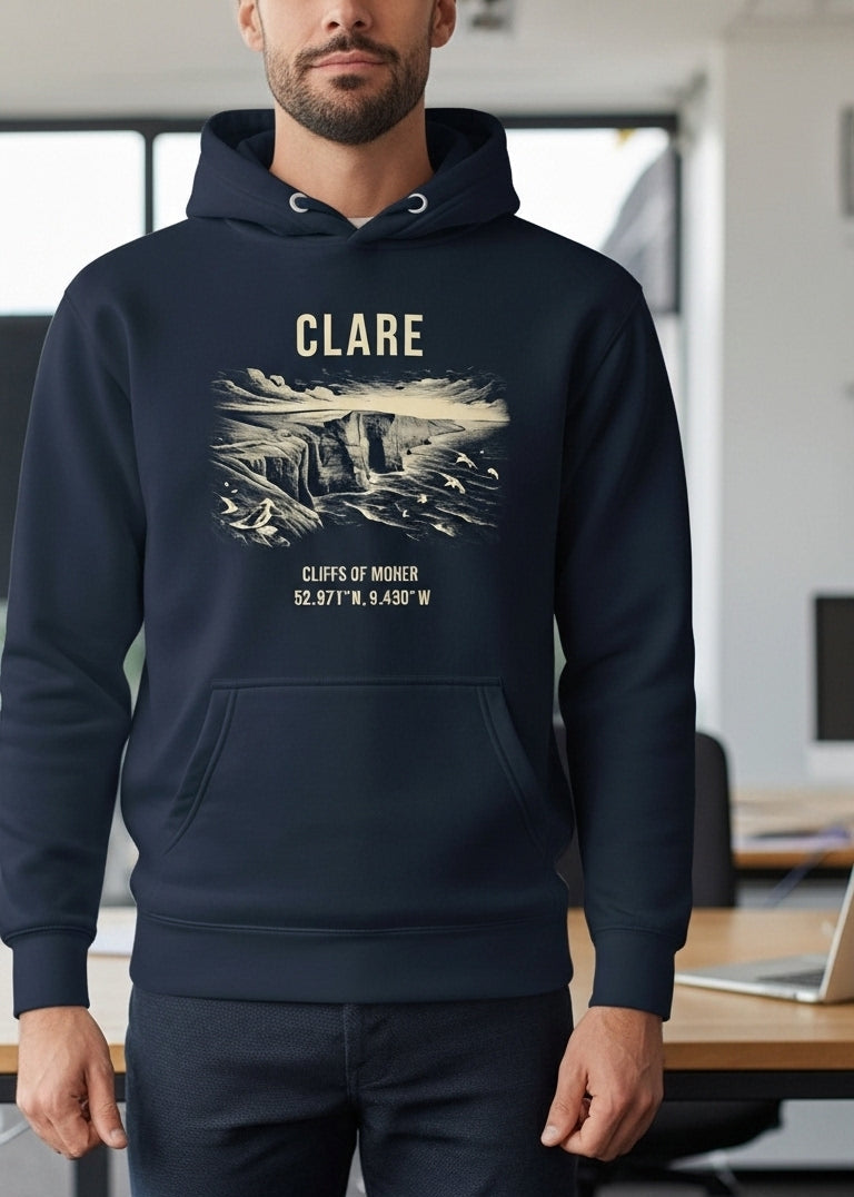 Person wearing a navy hoodie with 'Clare' design in an office setting