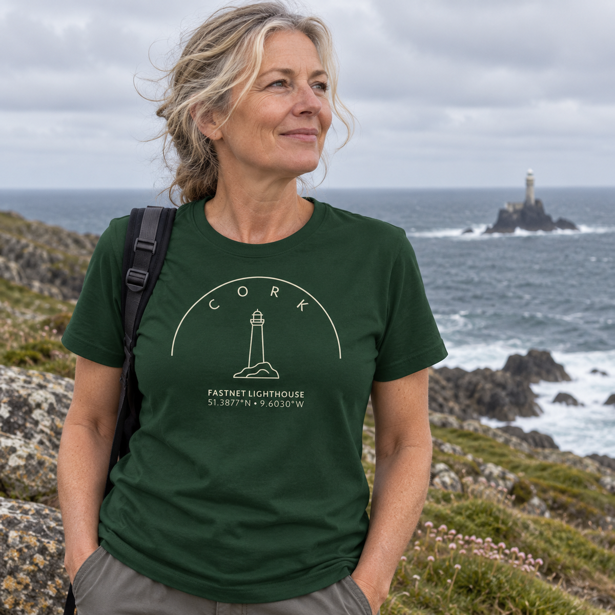 Woman wearing Cork Fastnet Lighthouse forest green T-shirt