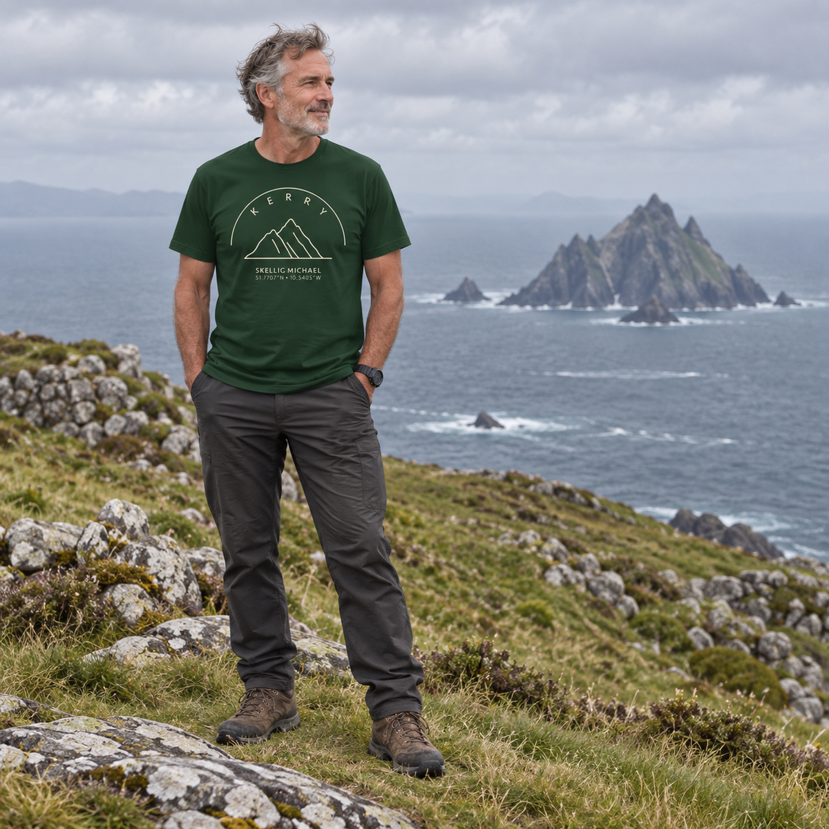 Man wearing Kerry Skellig Michael forest green T-shirt