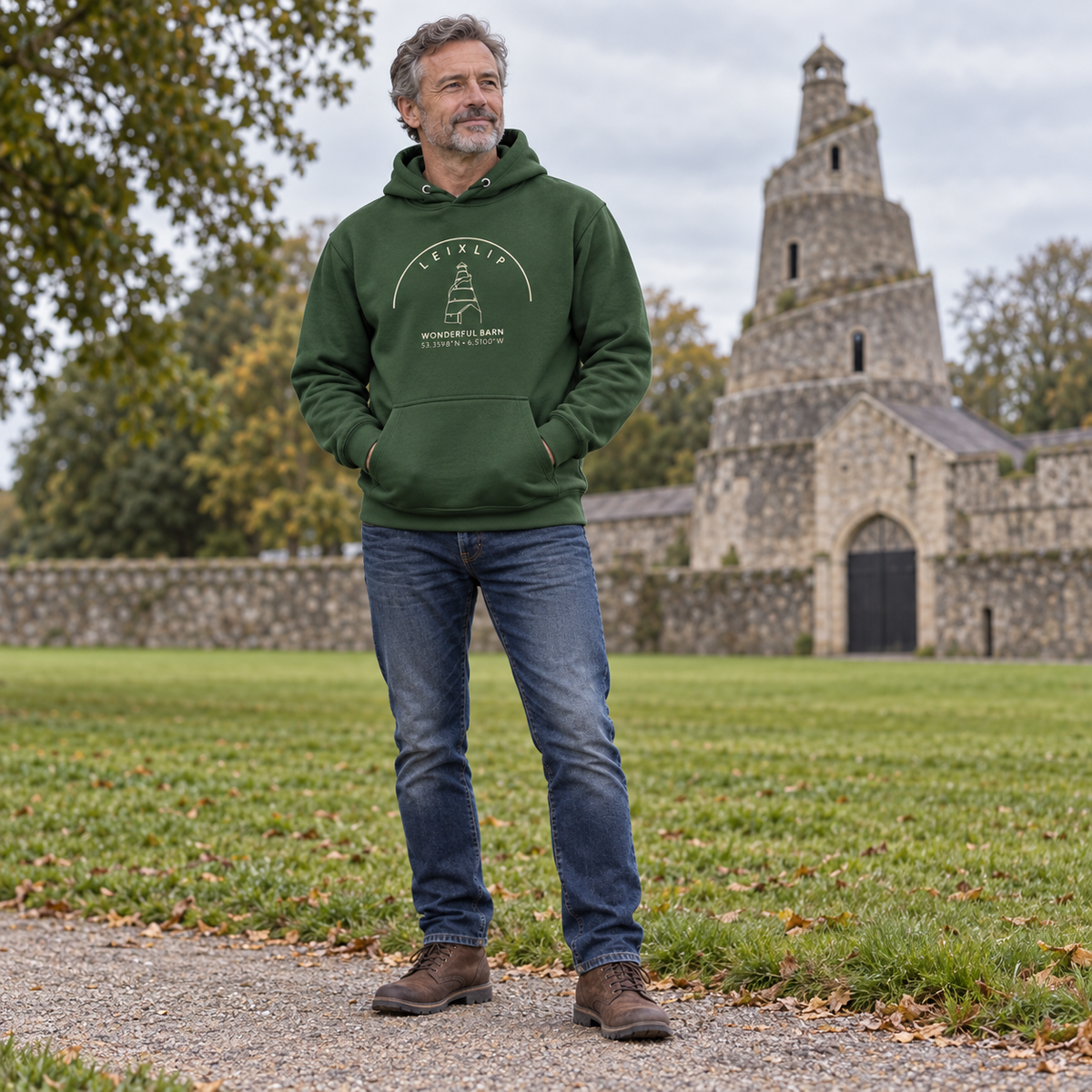 Man wearing the Leixlip Wonderful Barn forest green hoodie at the Wonderful Barn
