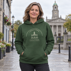 Woman wearing the Longford St. Mel’s Cathedral Hoodie in Irish Forest Green