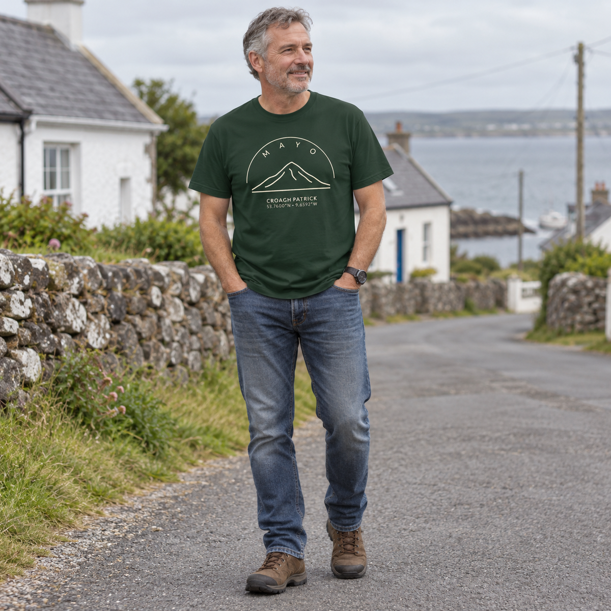 Man wearing Mayo Croagh Patrick forest green T-shirt in a local setting
