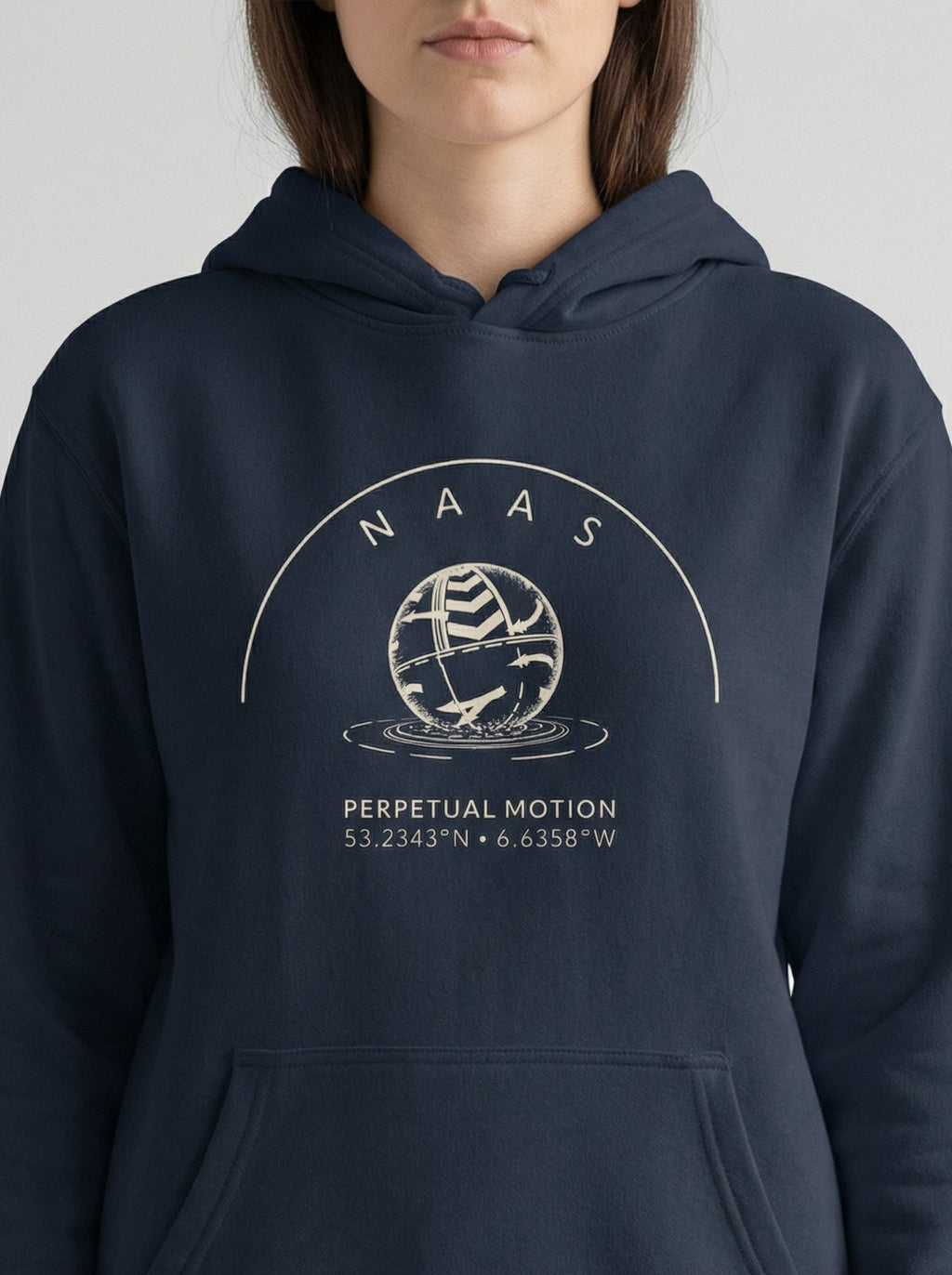 Navy blue hoodie with 'NAAS' logo worn by a person on a light gray background