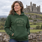 Woman wearing the Tipperary Rock of Cashel forest green hoodie at the Rock of Cashel