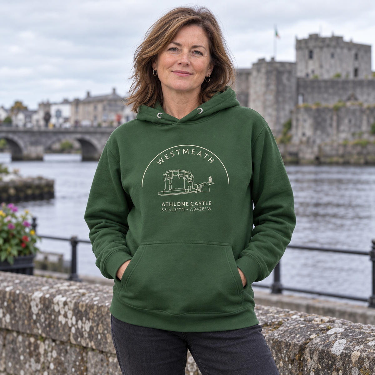 Woman wearing the Westmeath Athlone Castle forest green hoodie in Athlone